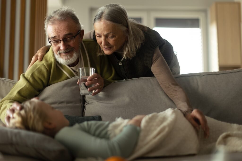 Grandparents taking care of their sick granddaughter.