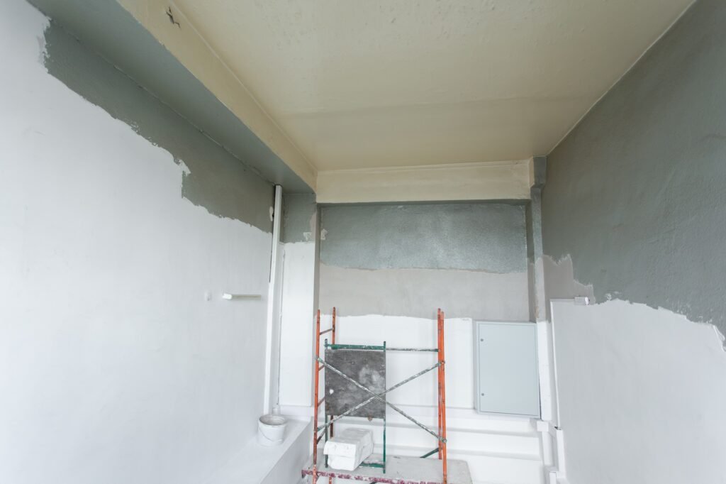 Room with ladders during under renovation, remodeling and construction